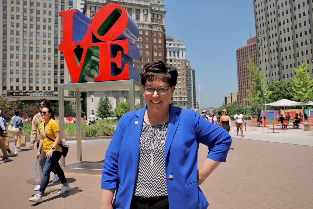 Kathryn Ott Lovell poses at Love Park