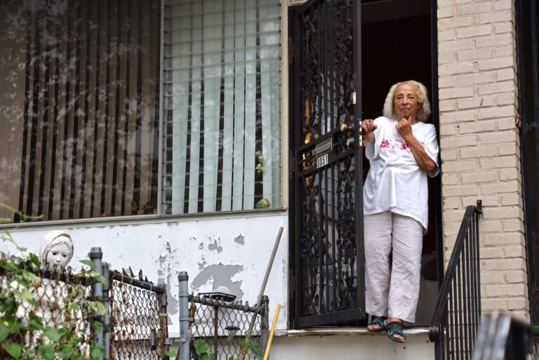 Blanca Maldonado standing outside her home