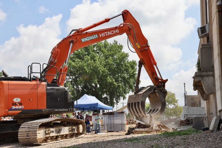 An excavator at the demolition site