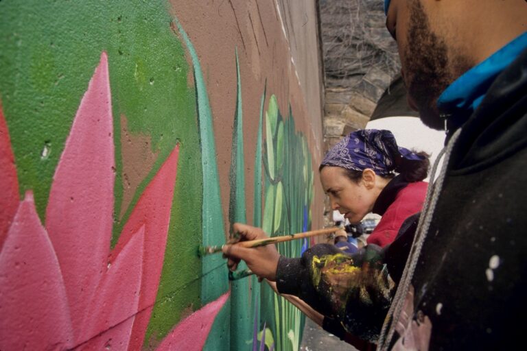 Jane Golden working on mural with Dietrich Adonis in 1994