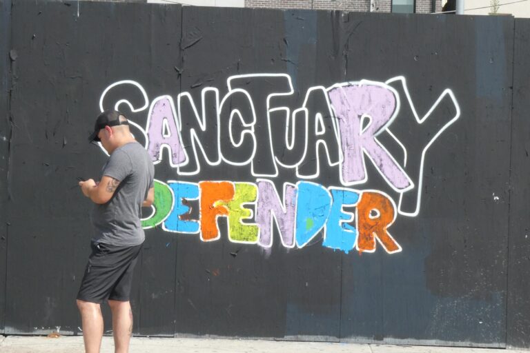 art on the art wall reads SANCTUARY FOREVER