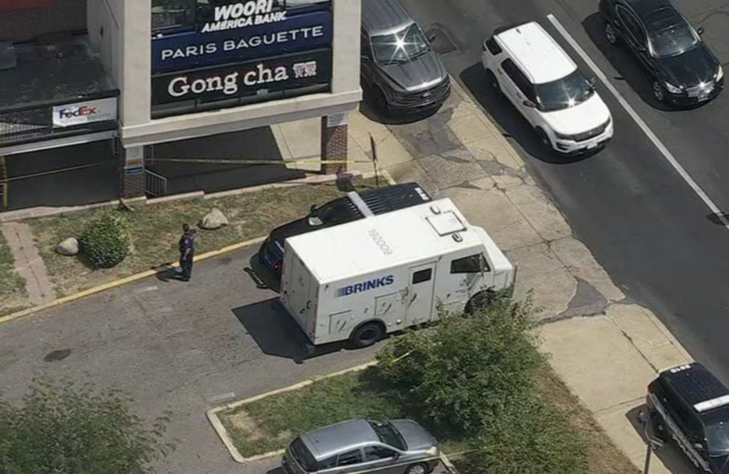 armored-truck-robbery-6abc-2025-08-12 An armored truck in a shopping center parking lot