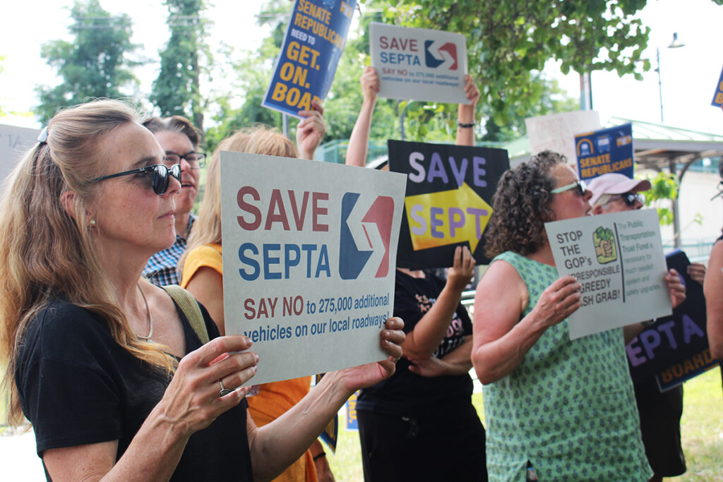 bucks-county-septa-rally-2025-08-14-5 Bucks County residents hold signs at a SEPTA funding rally