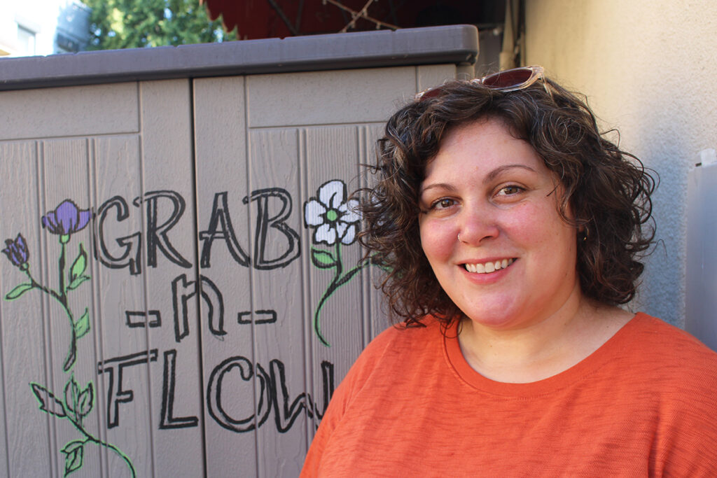 grab-n-flow-4 Shelley Aragoncillo poses for a picture alongside the original Grab n' Flow shed in South Philadelphia