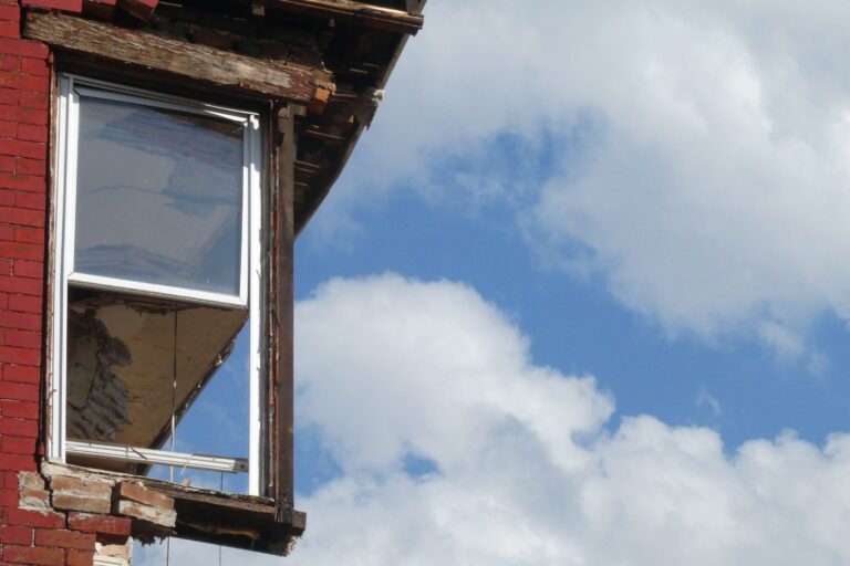a side-view of a collapsed Philadelphia house