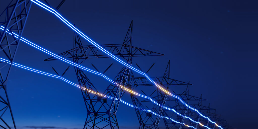 High voltage electric transmission tower with glowing current line, electrical power transmit through wire to city and house at night, Renewable green energy grid infrastructure concept 3d rendering High voltage electric transmission tower