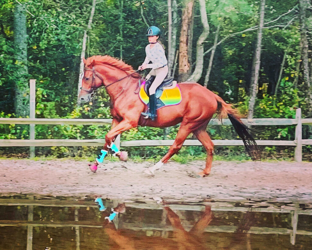 The horse Johnny being ridden