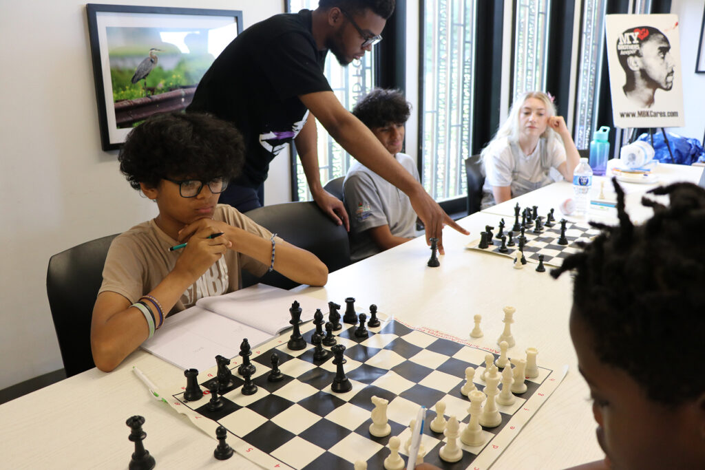 mbk_chess_08302025 Black male youths play chess