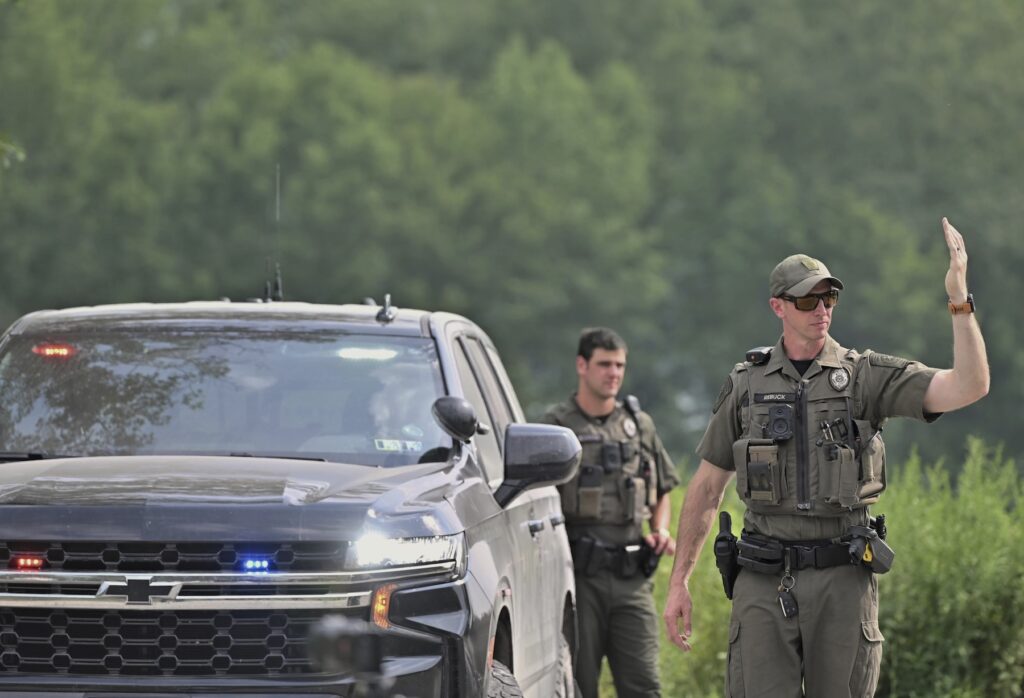 Pennsylvania Troopers Shot Police officers block the street