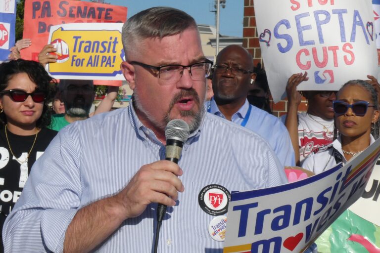 Benjamin Hover speaks at the rally