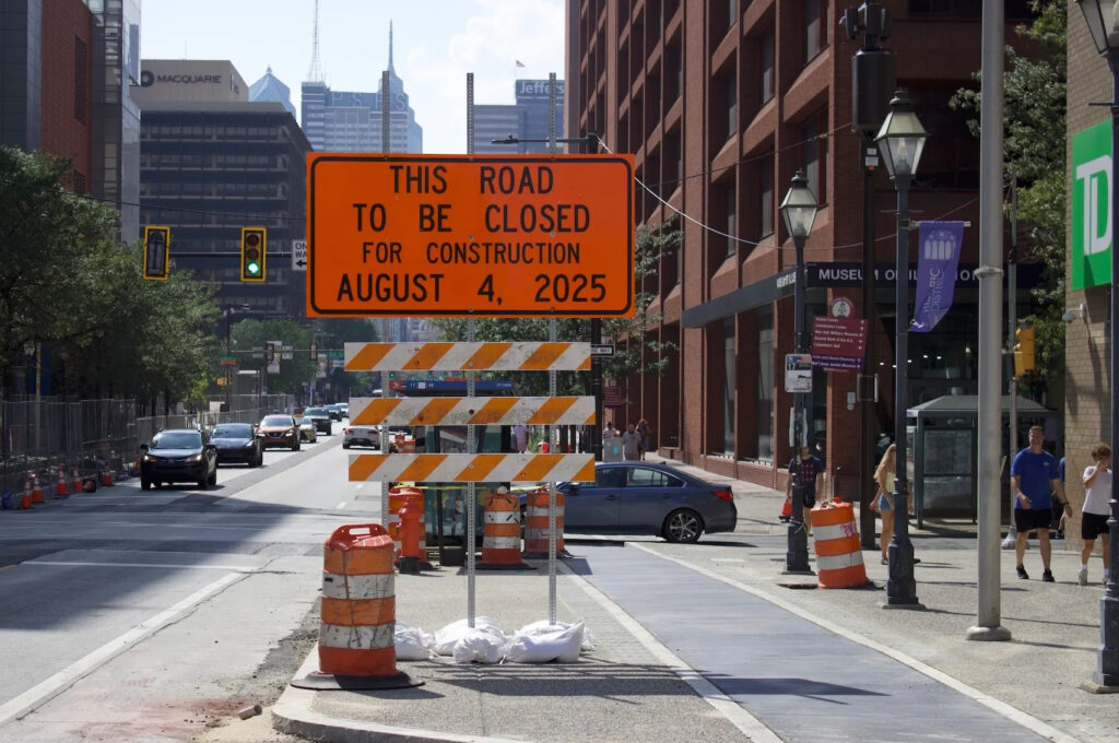 road-closure-sign-philadelphia-market-street-2025-08-04 a sign on Market Street reads THIS ROAD TO BE CLOSED FOR CONSTRUCTION AUGUST 4, 2025