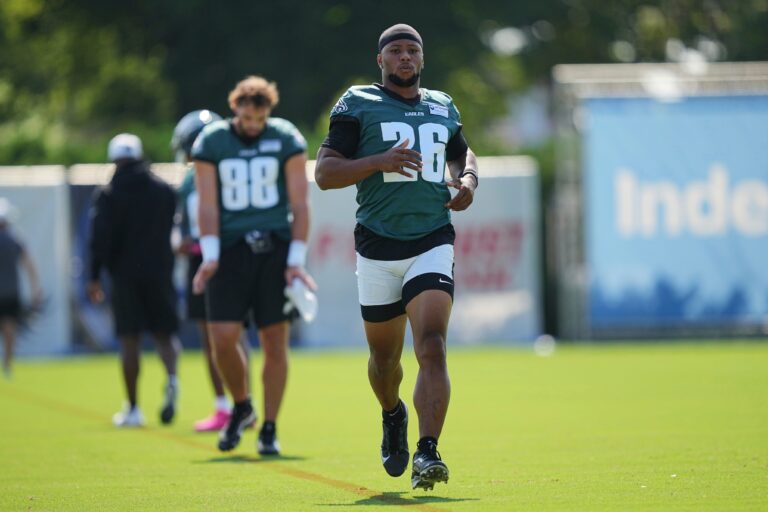 Saquon Barkley jogging during practice