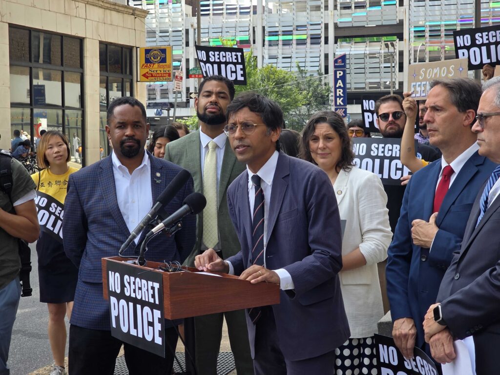 Nikil Saval speaks at an ICE rally
