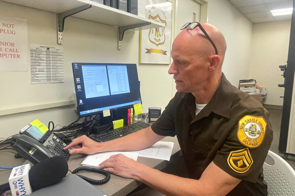 A police officer working at his desk