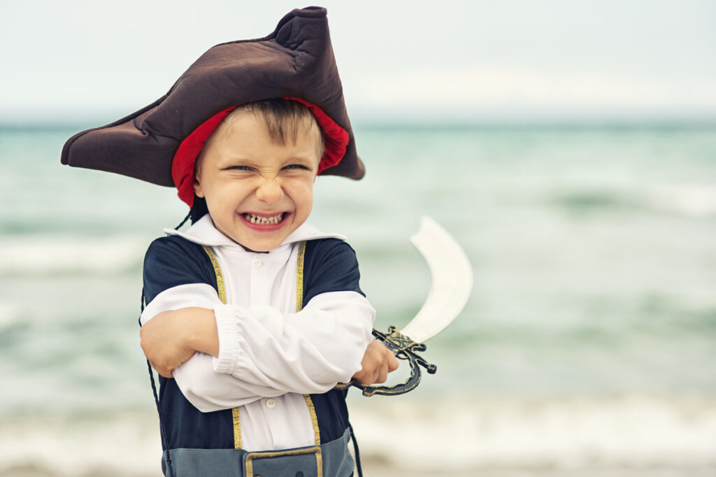 A child is dressed as a pirate