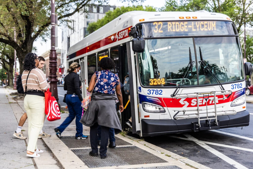 08-25-2025-k-paynter-SEPTA-cuts-reax-in-South-Philly-3-file Philadelphians board 32 bus