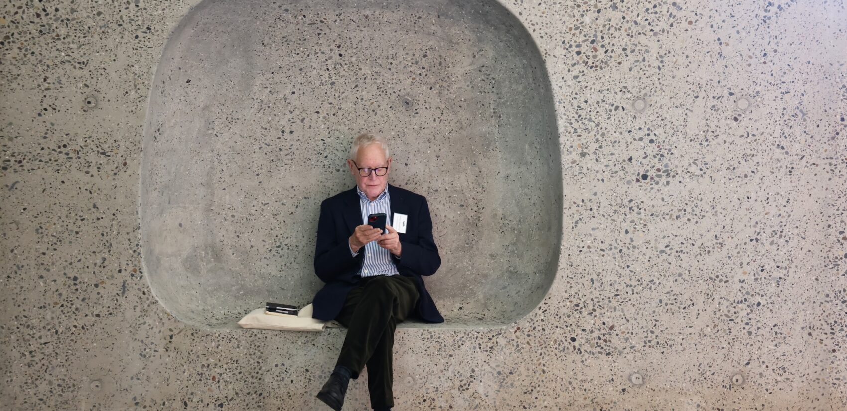 A visitor sits at Calder Gardens