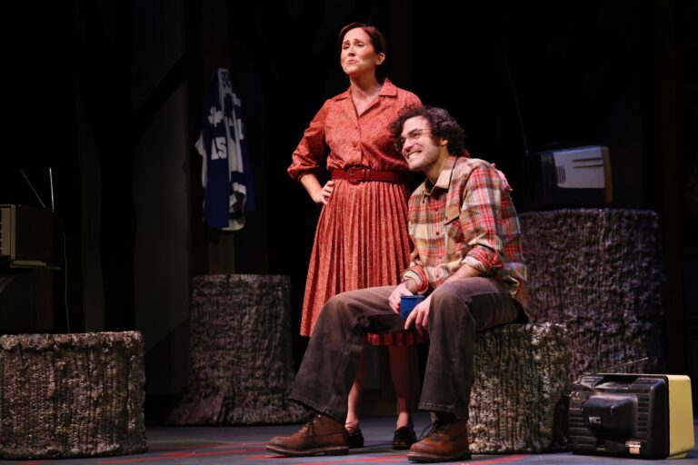 A man and woman on stage together