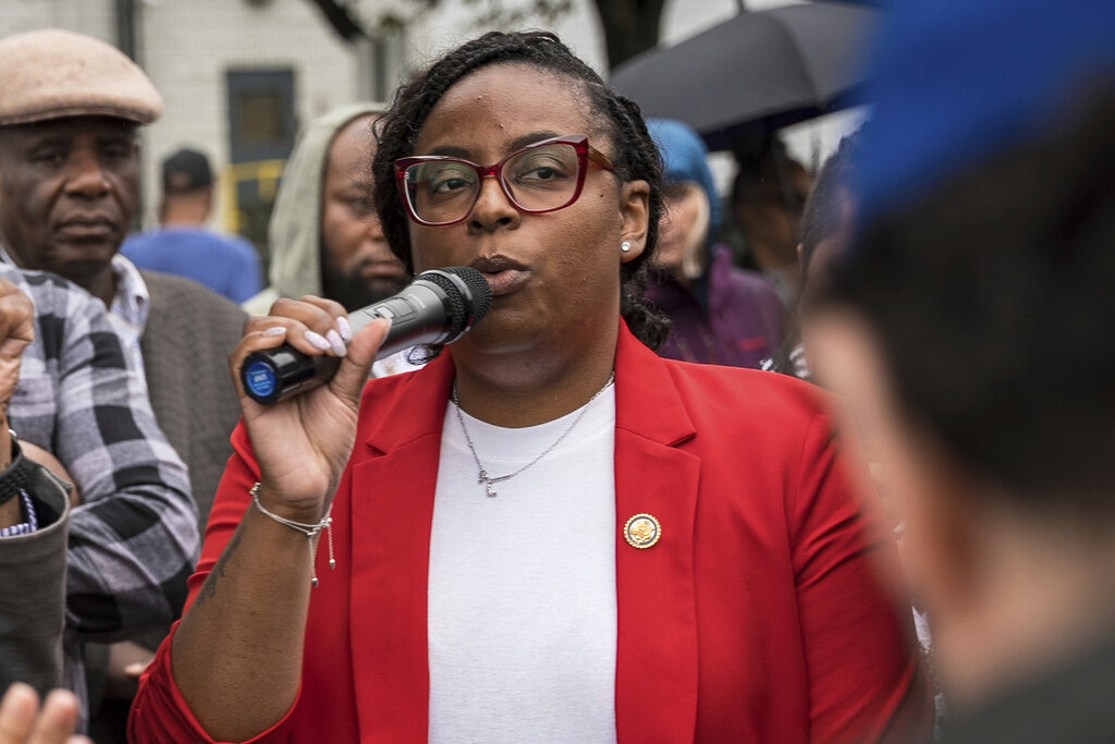 New Jersey Rep. LaMonica McIver speaks into a microphone outside of an immigrant detention center in Newark, New Jersey
