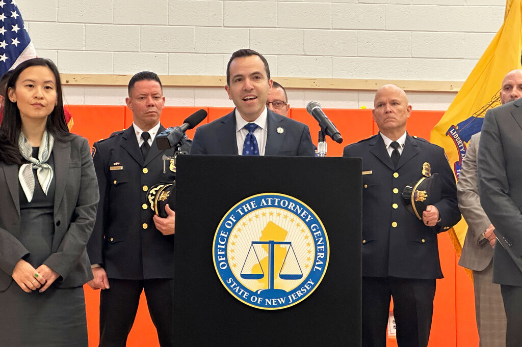 Guns New Jersey New Jersey Attorney General Matt Platkin speaks at a podium