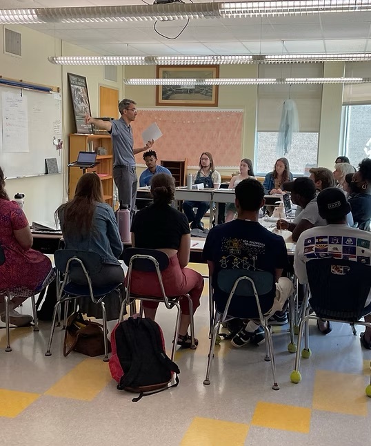 A teaching fellow leads a classroom during Breakthrough's programming.
