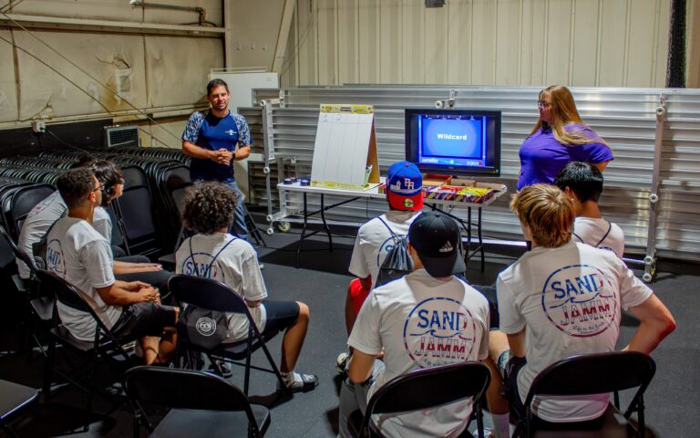 Instructors at Cape Assist interact with students