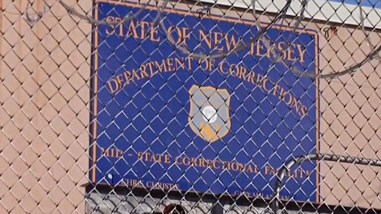 a sign for The Mid-State Correctional Facility