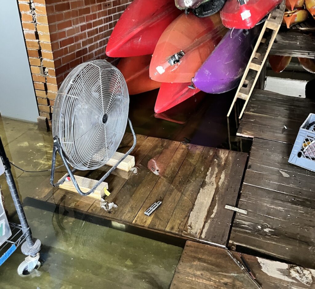 Fan in flooded boathouse