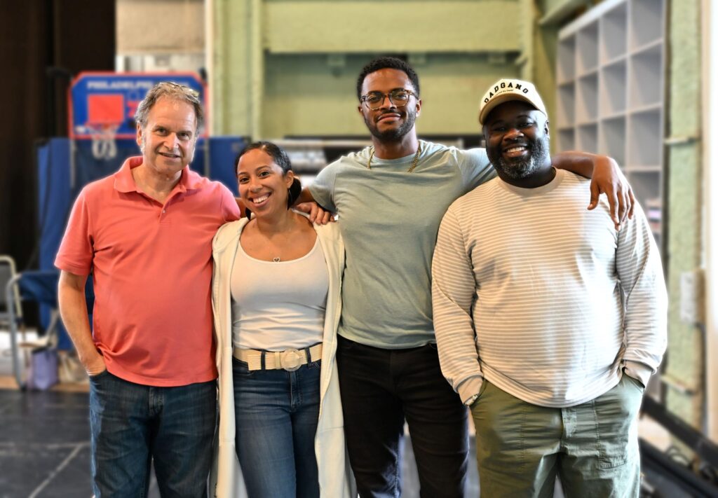 Members of a theater company pose for a photo