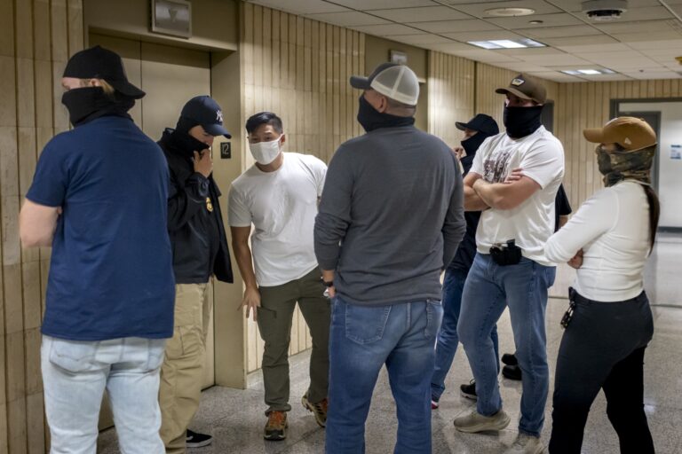 Federal agents patrol the halls of immigration court