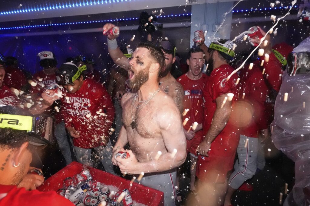 Phillies Dodgers Baseball Philadelphia Phillies' Bryce Harper, center, celebrates after the Phillies clinched the NL East following their defeat of the Los Angeles Dodgers Monday, Sept. 15, 2025, in Los Angeles.