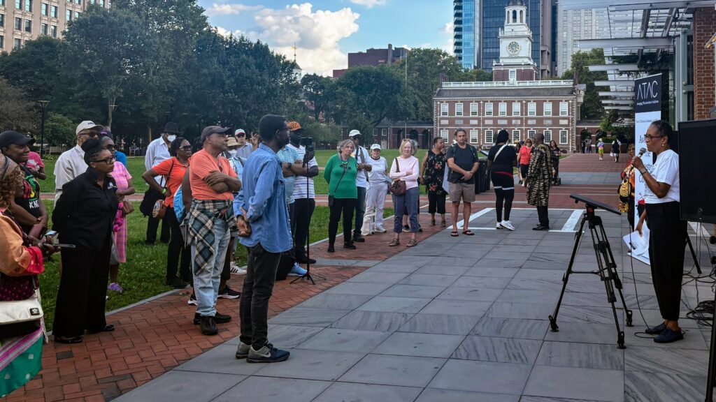 Michelle Flamer speaks to protesters at Independence National Historical Park