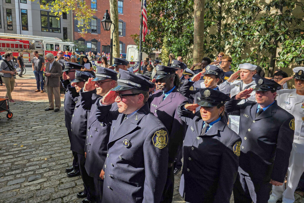 philly-police-911-t-macdonald-2025-09-11-2 Members of Philadelphia’s police and fire departments gather