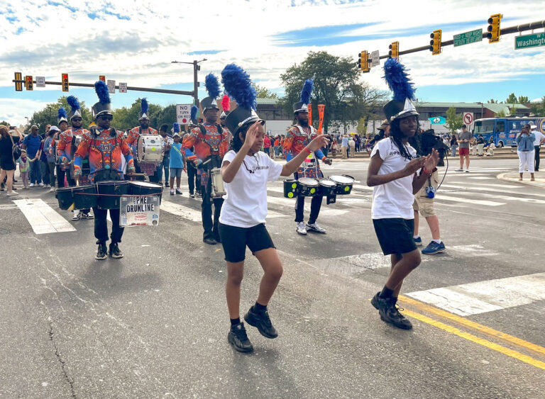 A drumline marches through South Philadelphia