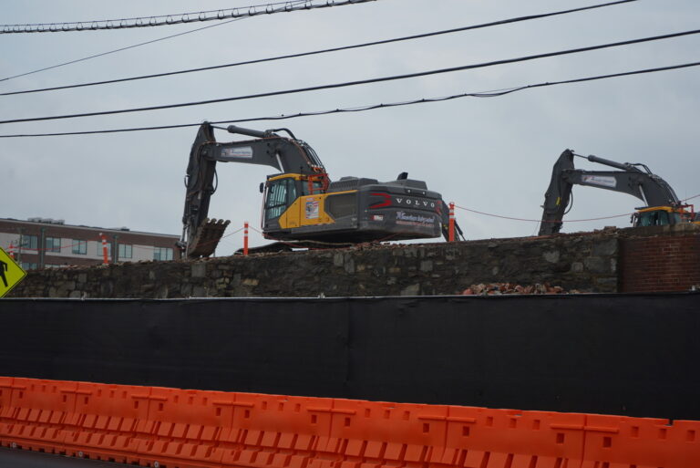 Construction vehicles are seen at the former SPS Technologies plant in Jenkintown