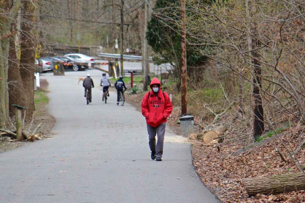 2021-04-01-e-lee-delaware-county-ridley-creek-state-park-6532 People walk along the multi-use trail at Ridley Creek State Park in Media, Pa.