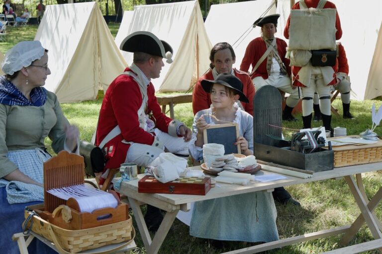 Loyalist soldiers and camp followers reenacting the Battle of Brandywine