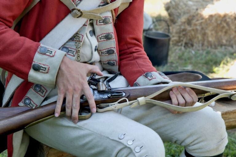 Reenactor shows details of revolutionary war weapon