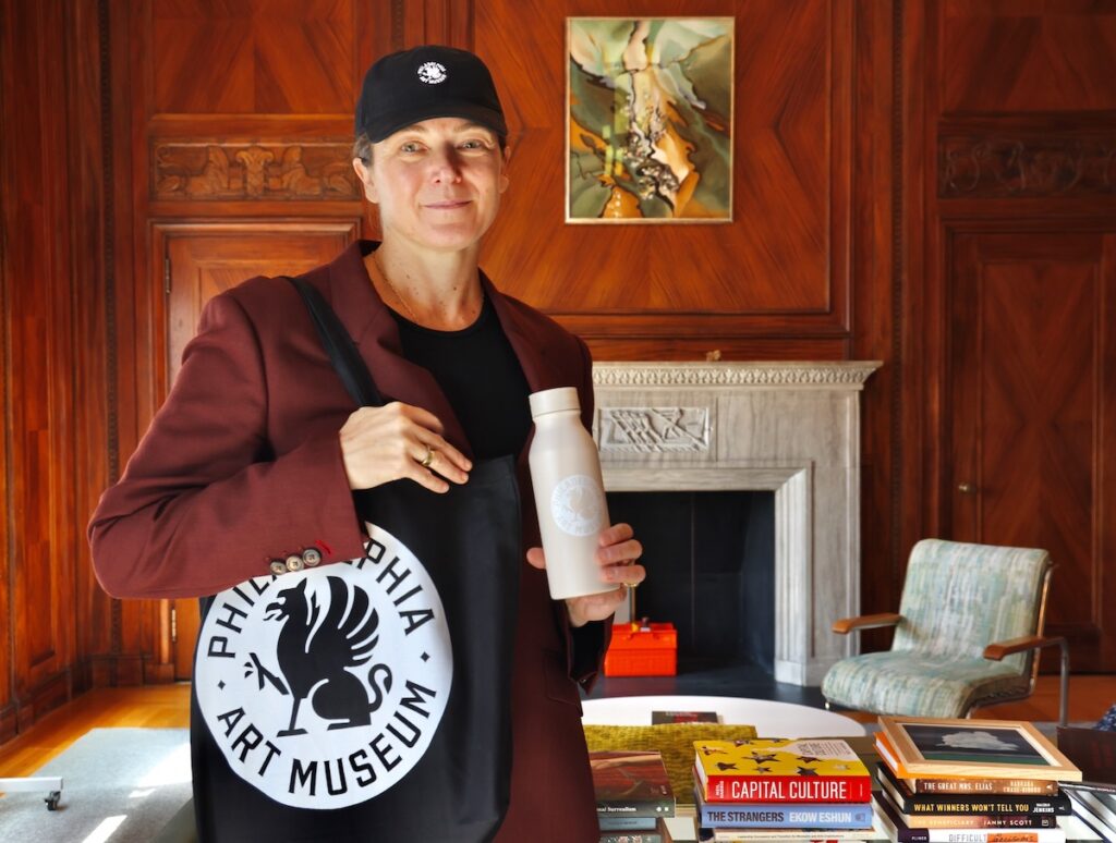 2025 10 06-e lee-sasha suda-philadelphia art museum-rebranding merch Sasha Suda with merchandise of new art museum logo