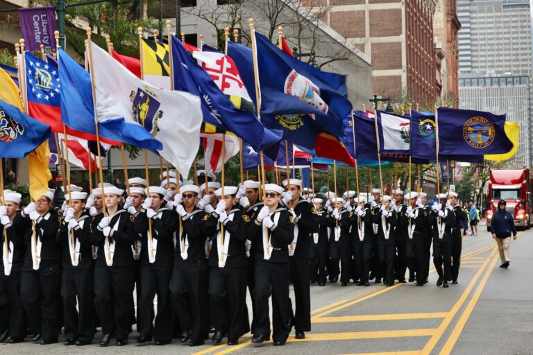 U.S. Naval Sea Cadets carry flags