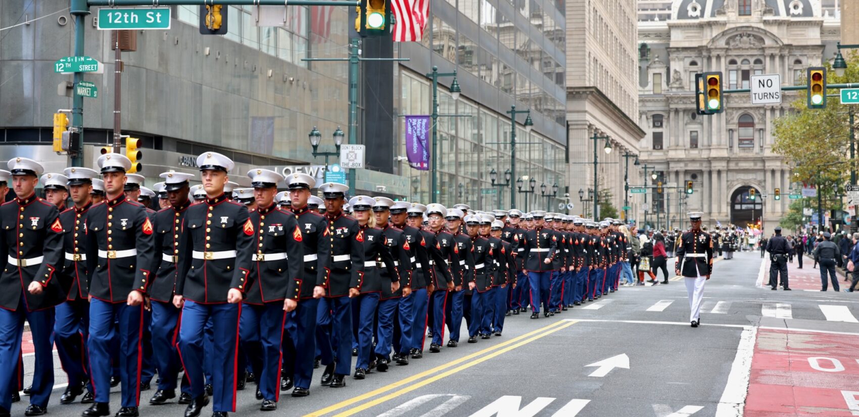 Hundreds of Marines march down Market Street