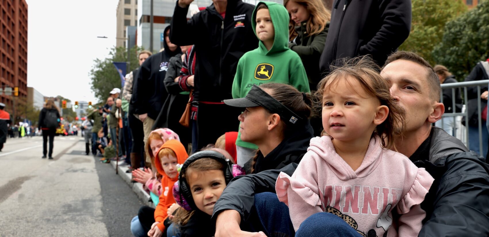 Spectators line Market Street to watch the Navy and Marine Corps 250th parade