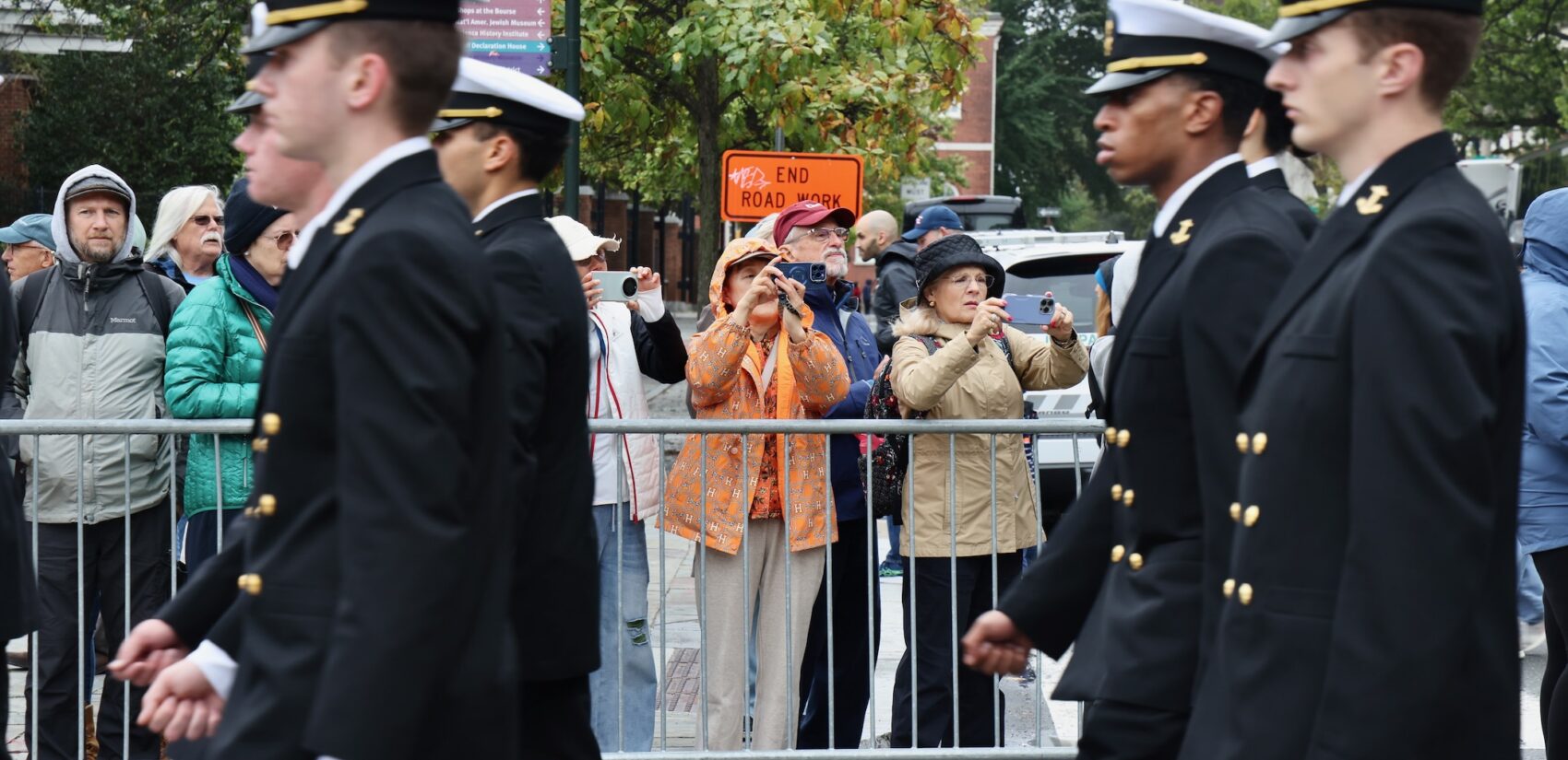 Spectators line Market Street to watch the Navy and Marine Corps 250th parade