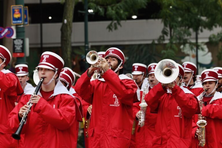 The Temple Universary marching band performing