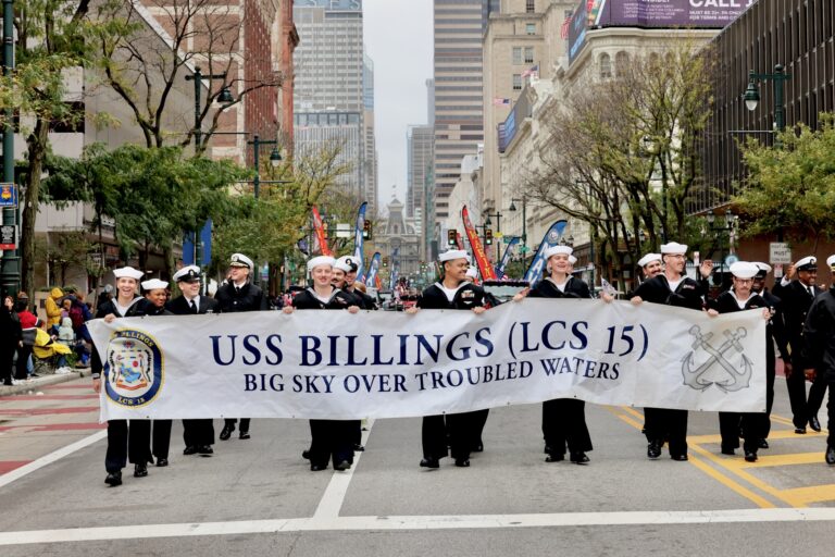 Members of the crew of the USS Billings march