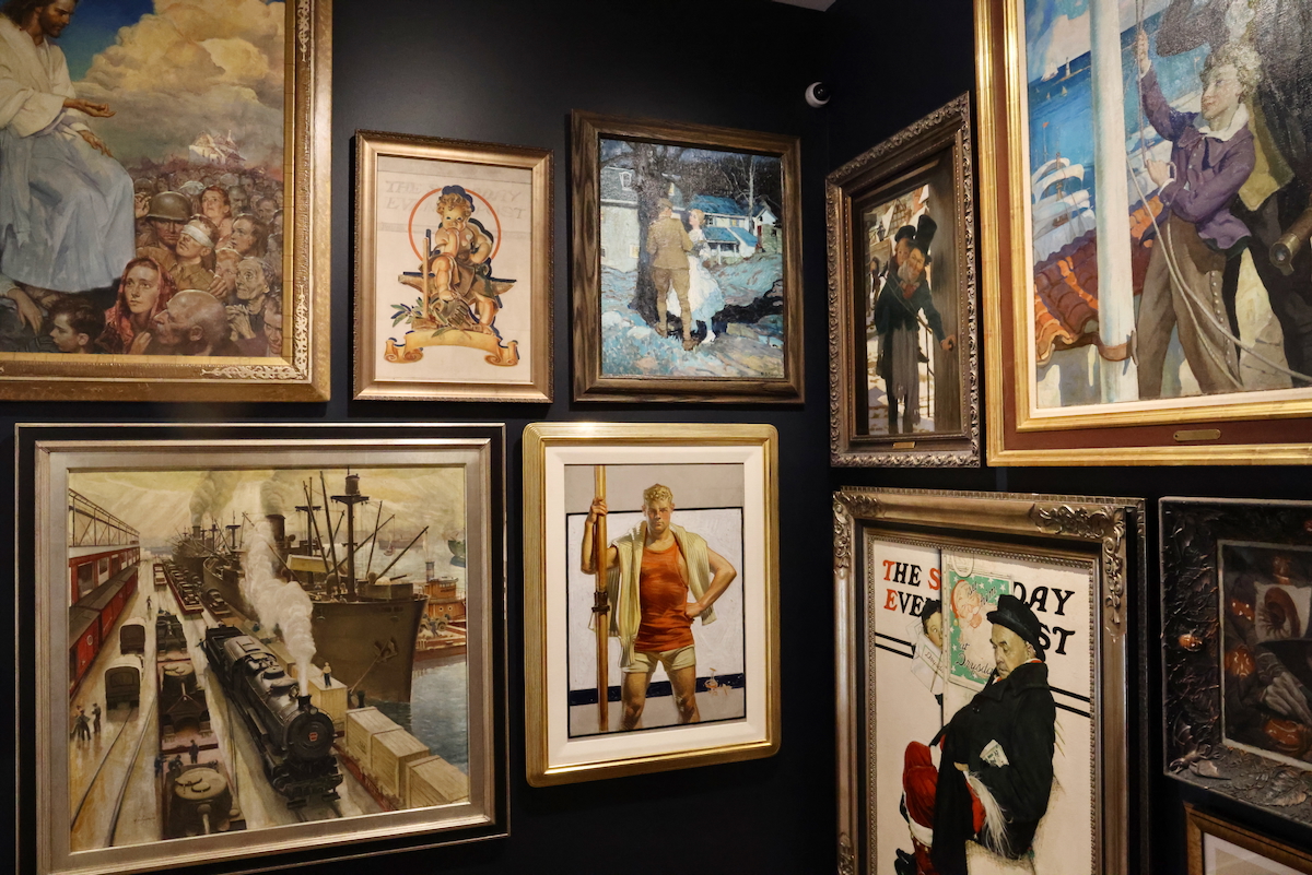 paintings on display in the gallery