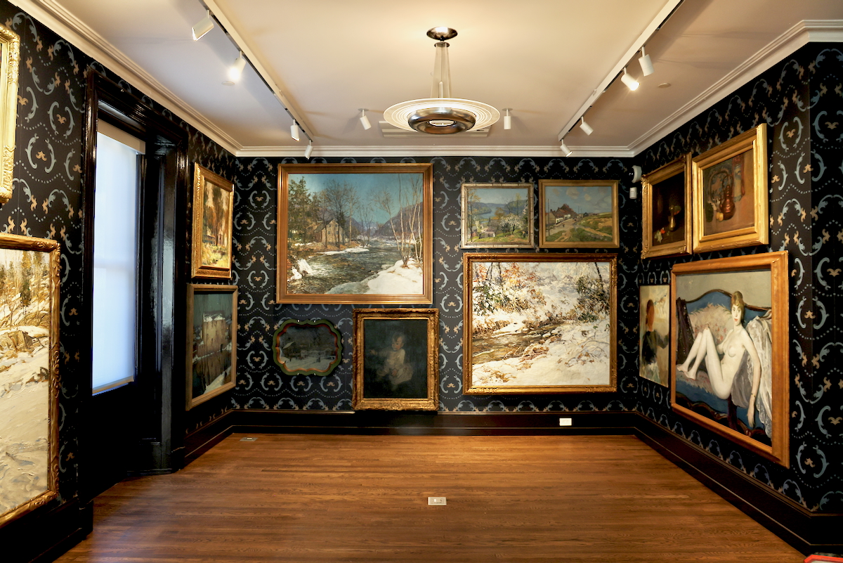 paintings on display in the gallery