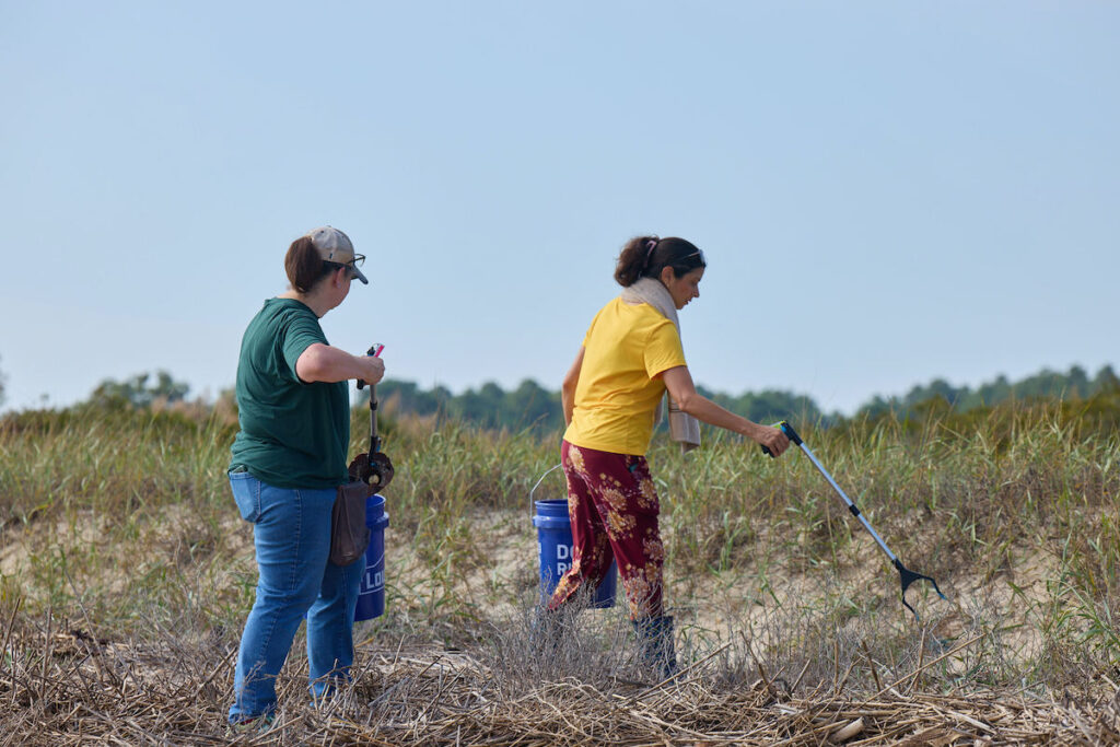 9-13-25_Event_Volunteers Join 38th Annual Delaware Coastal Cleanup _Photo_By_Errol Ebanks_CB2A3039 Volunteers picking up trash at the shore
