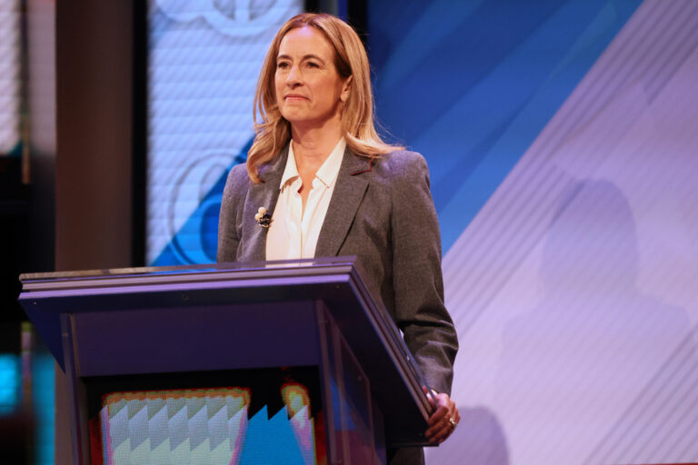 New Jersey Democrat Mikie Sherrill participates in a gubernatorial debate as she stands behind a podium