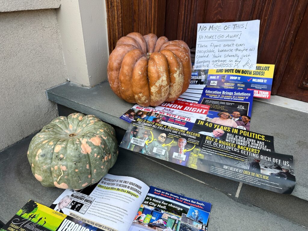 A Halloween display of unwanted campaign fliers